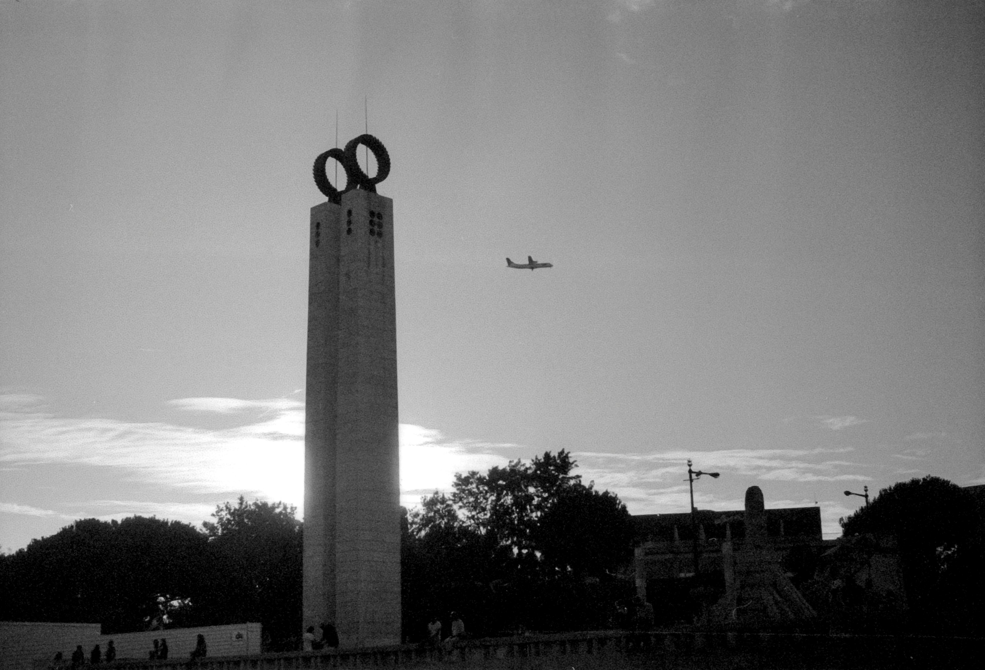 gray concrete tower under gray sky